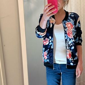 Floral printed bomber jacket.
